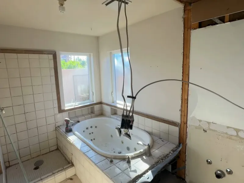 Bathroom plumbing work is shown around the tub, shower valve, or open wall area near Cerritos, CA on Shower & Bathtub Installation in Cerritos, CA body sbi 002