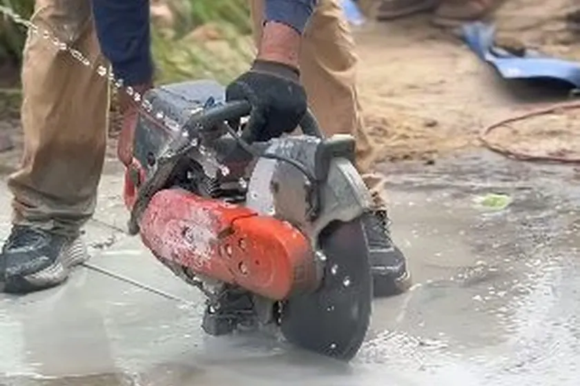 Drain cleaning equipment is used at a pipe access point to clear buildup near Cerritos, CA on Hydro Jetting in Cerritos, CA faq hj 003