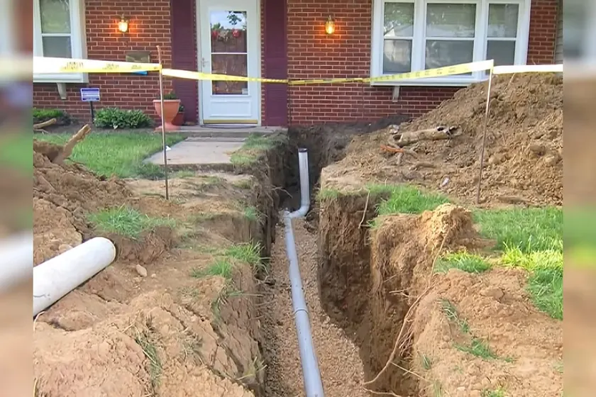 Exterior sewer work shows trenchless equipment, open excavation, or new pipe placement near Cerritos, CA on Sewer Line Replacement in Cerritos, CA faq slrp 003