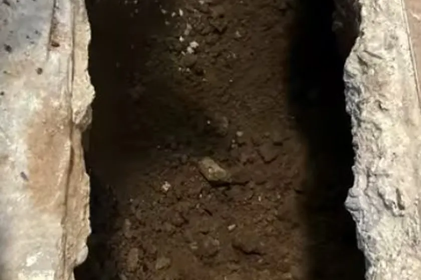 Leak detection work exposes the pipe area so the failure point can be confirmed near Cerritos, CA on 7 Signs of a Hot Water Slab Leak in Cerritos Homes