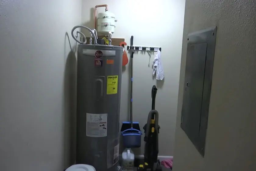 A technician documents water heater connections during inspection near Cerritos, CA on Homeowners Insurance and Slab Leaks in California: What Cerritos Homeowners Actually 