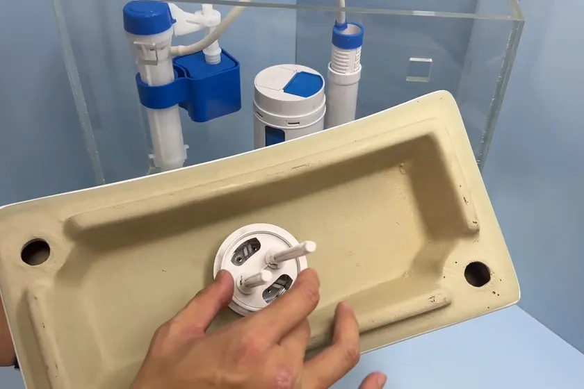 Toilet tank parts and fixture connections are checked during repair work near Cerritos, CA on Toilet Repair & Installation in Cerritos, CA faq tri 003