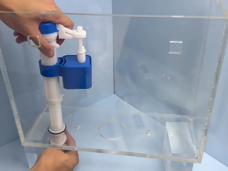 Toilet tank parts and fixture connections are checked during repair work near Cerritos, CA on Toilet Repair & Installation in Cerritos, CA body tri 002