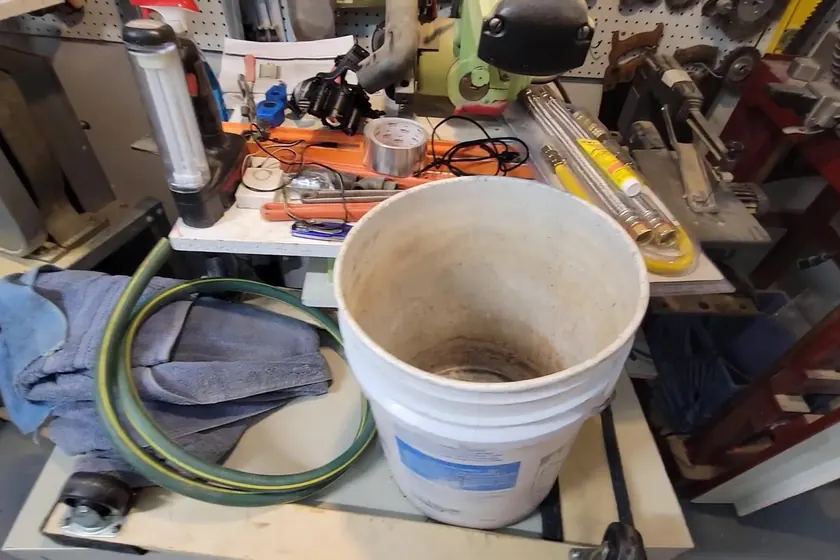 A water heater tank, valve, or supply connection is inspected during service near Cerritos, CA on Water Heater Installation & Replacement in Cerritos, CA faq whi 003
