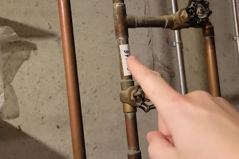 A water heater tank, valve, or supply connection is inspected during service near Cerritos, CA on Water Heater Repair in Cerritos, CA faq whr 003
