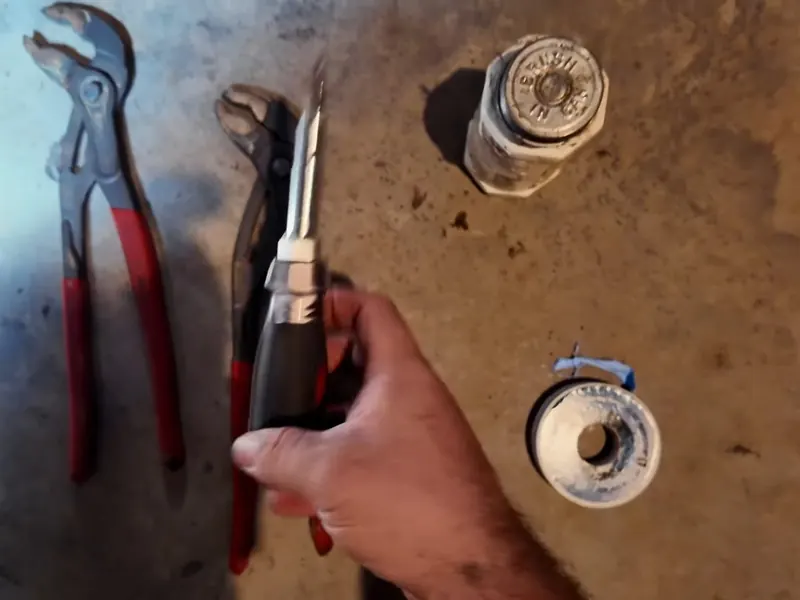 A water heater tank, valve, or supply connection is inspected during service near Cerritos, CA on Gas Line Installation & Repair in Cerritos, CA