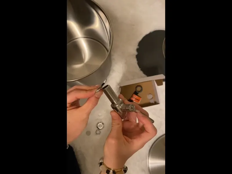 A water softener system is inspected with its brine tank, valve head, or inlet piping visible near Cerritos, CA on Water Filtration Installation in Cerritos, CA