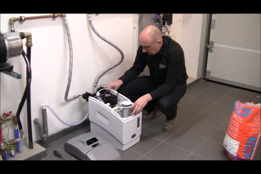 A water softener system is inspected with its brine tank, valve head, or inlet piping visible near Cerritos Town Center, Cerritos, CA on Plumber in Cerritos Town Center, CA